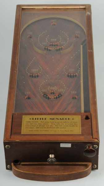 Appraisal: Wooden Little Monarch Coin-Operated Game Description Early s game Working