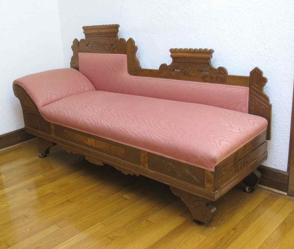 Appraisal: EASTLAKE VICTORIAN DAY BED FAINTING COUCH Incise carved burled walnut