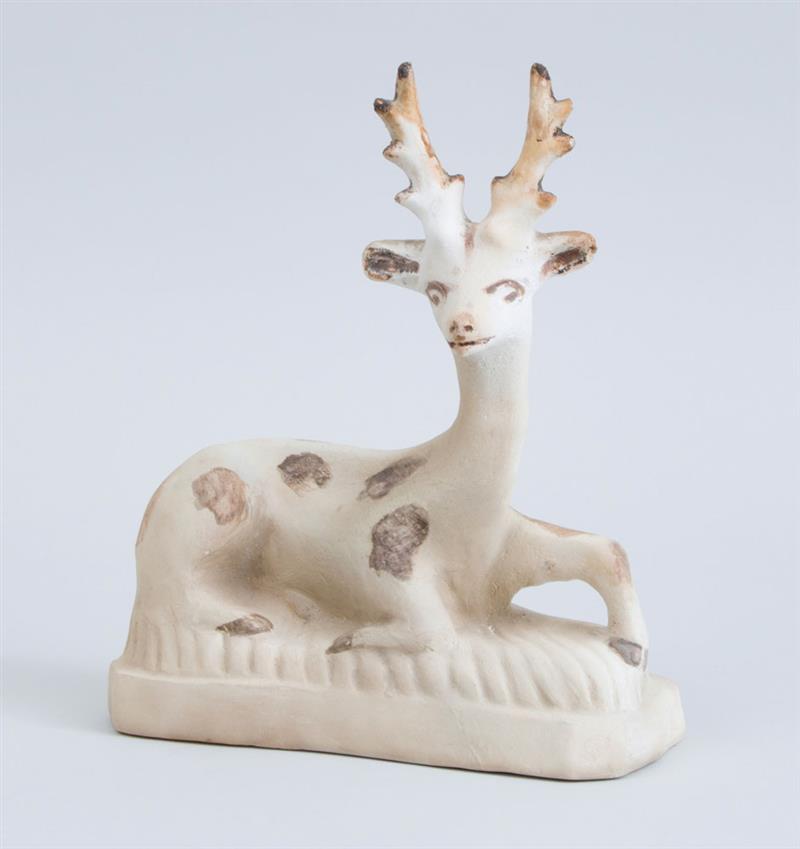 Appraisal: CHALKWARE FIGURE OF A RECUMBENT STAG x in Collection of