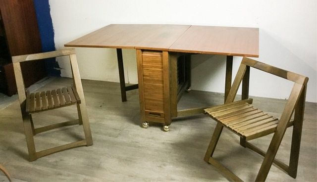 Appraisal: Danish Modern Gateleg Table With Folding Chairs With folding chairs