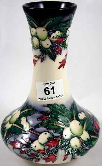 Appraisal: Moorcroft Vase decorated with white fruit with red green leaves