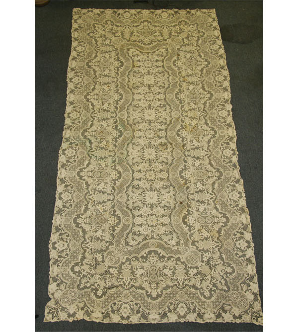 Appraisal: Antique hand crocheted lace tablecloth and coordinating table linens Tablecloth