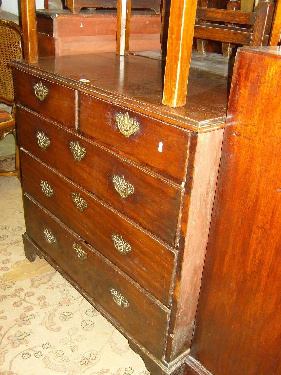 Appraisal: A Georgian mahogany and pine sided chest fitted with long