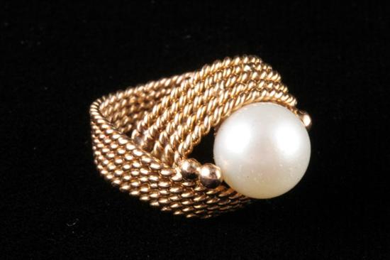 Appraisal: YELLOW GOLD AND CULTURD PEARL RING mm pearl centered by