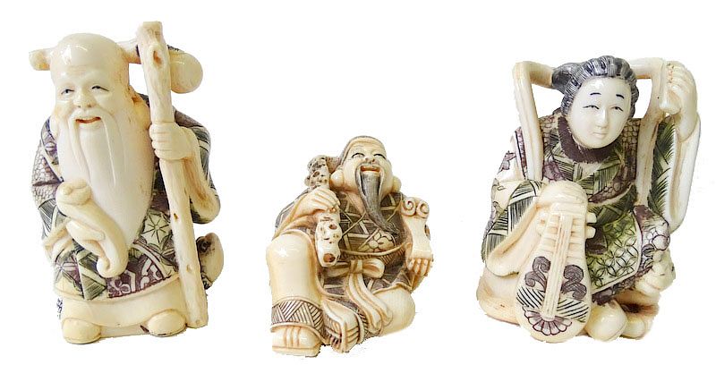 Appraisal: Three Chinese Carved Netsuke Figures Three Chinese Carved Ivory Netsuke