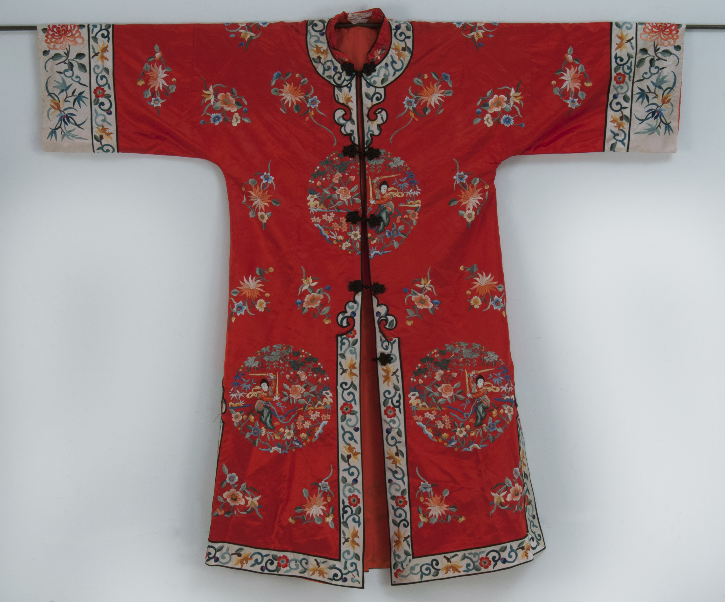 Appraisal: CHINESE SILK AND SYNTHETIC NEEDLEWORK ROBE th CenturyWith figural medallion