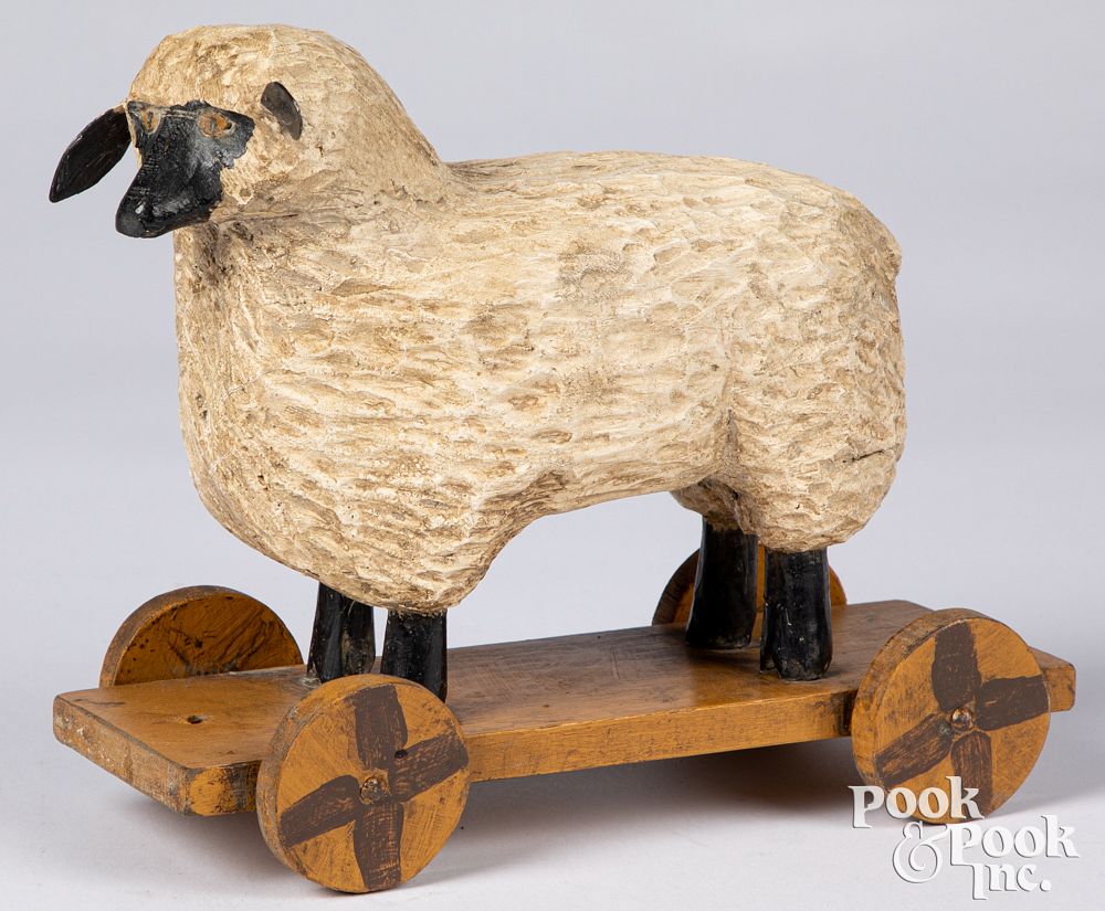 Appraisal: Carved painted sheep pull toy signed Schifferl Carved and painted