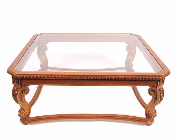 Appraisal: A Neoclassical style wood and glass coffee table height in