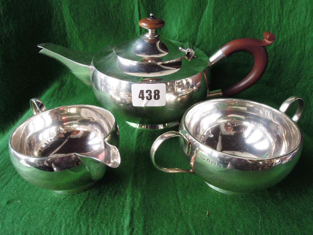 Appraisal: An Art Deco silver teapot with jug and sugar bowl