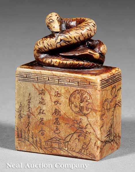 Appraisal: A Chinese Soapstone Seal rectangular body surmounted by a coiled