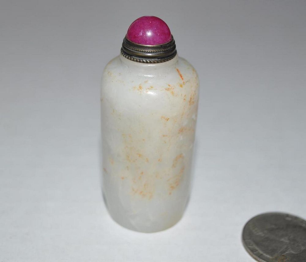 Appraisal: Chinese Carved Jade Hardstone Snuff Bottle the lid with red