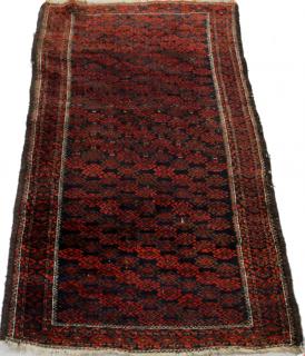 Appraisal: BALUCHISTAN RED AND INDIGO BLUE ORIENTAL RUG C W '