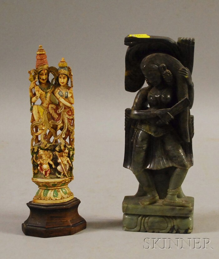 Appraisal: Two Indian Carvings a soapstone carving of a woman combing