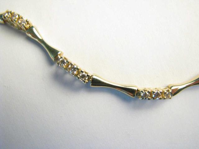 Appraisal: A K yellow gold bar link line bracelet with twenty-seven