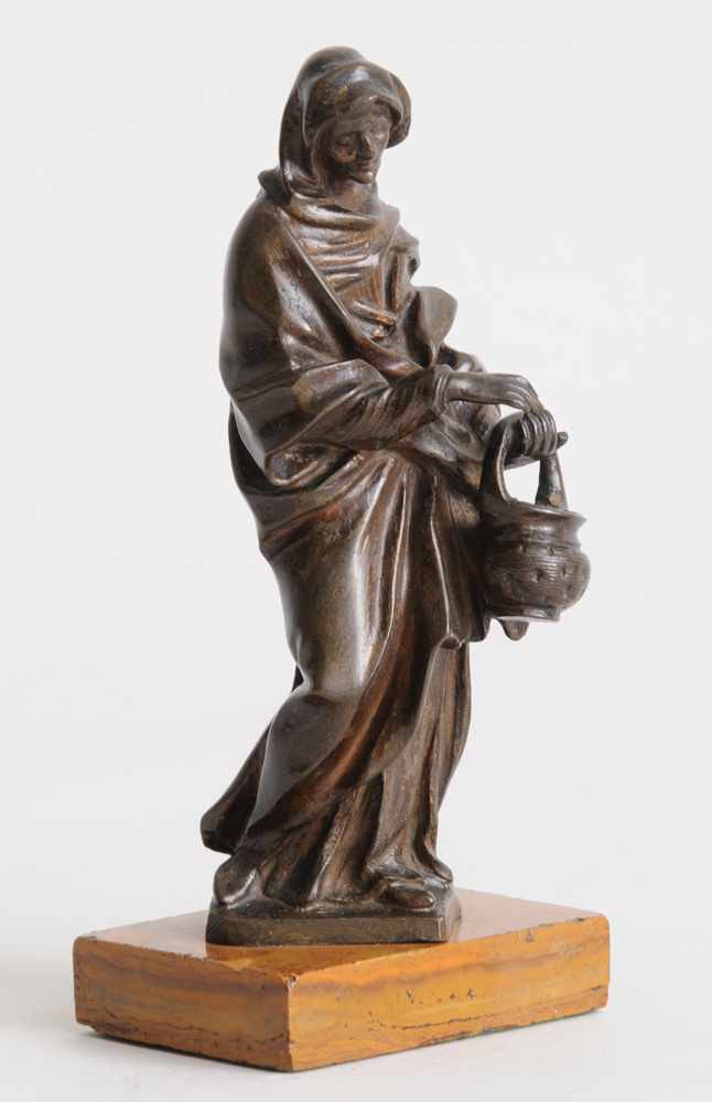 Appraisal: ROMAN BRONZE ALLEGORICAL FIGURE OF WINTER The cloaked figure holding