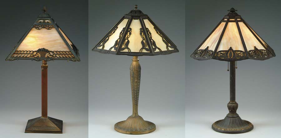 Appraisal: THREE PANEL LAMPS Lot of three carmel slag panel lamps