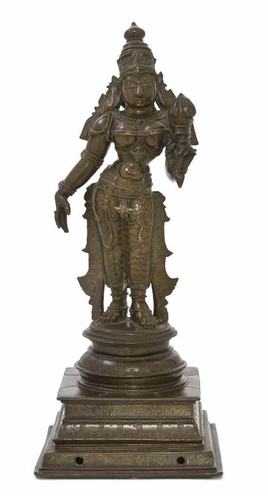 Appraisal: A Bronze Model of Parvati depicted in a standing pose