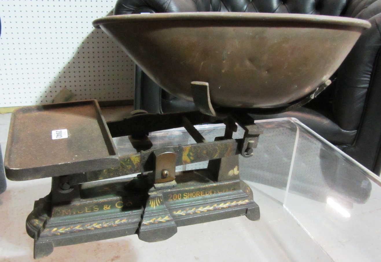 Appraisal: A large set of cast iron kitchen scales