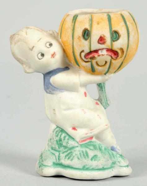 Appraisal: Halloween Bisque Boy Holding Jack-O-Lantern Made in Germany Condition Excellent