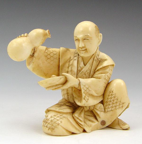 Appraisal: CHINESE CARVED FIGURE MAN POURING SAKE FROM GOURD '' h