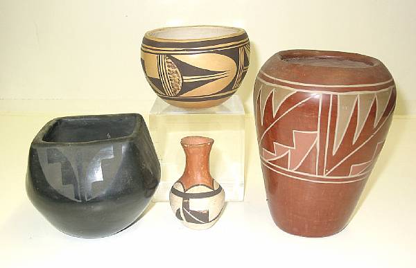 Appraisal: Four Pueblo pottery vessels including an Acoma miniature vase a