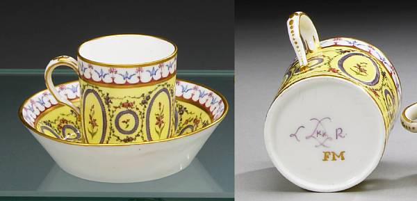 Appraisal: A Sevres porcelain coffee can and saucer dated With gilt