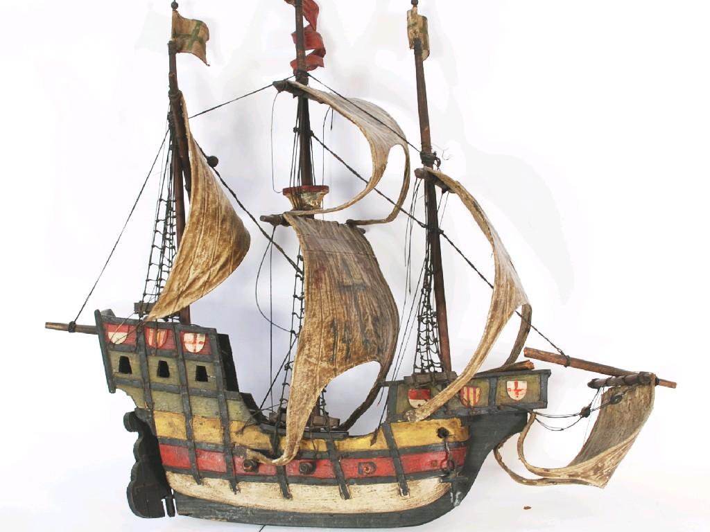 Appraisal: PAINTED WOOD MODEL OF A GALLEON with stiff fabric sails