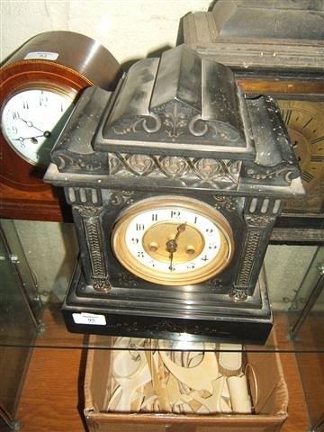 Appraisal: A Continental slate mantel clock with bronze Gothic decoration the