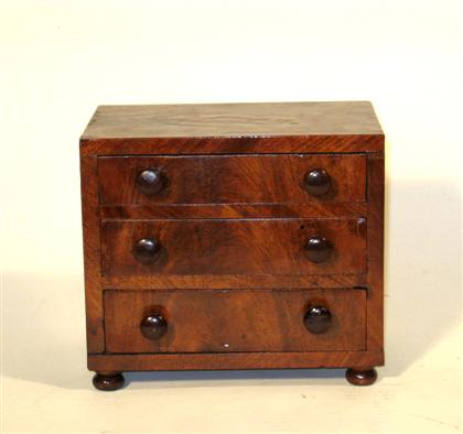 Appraisal: Miniature mahogany chest of drawers th century Rectangular top over