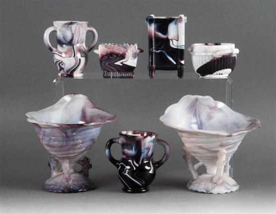 Appraisal: Seven assorted amethyst marbled glass articles probably Sowerby late th