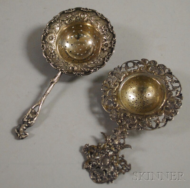 Appraisal: Two Silver Tea Strainers one silver German with openwork scroll