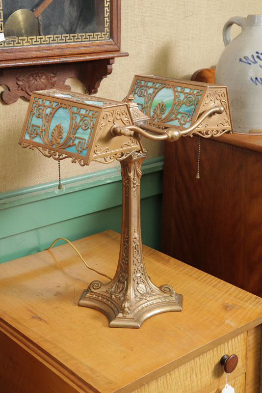 Appraisal: TABLE LAMP Possibly Wilkinson Cast brass lamp having slag glass