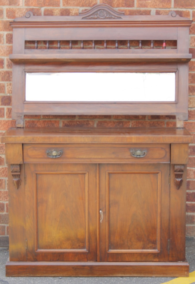 Appraisal: A Victorian chiffonier of good proportion the upper with a