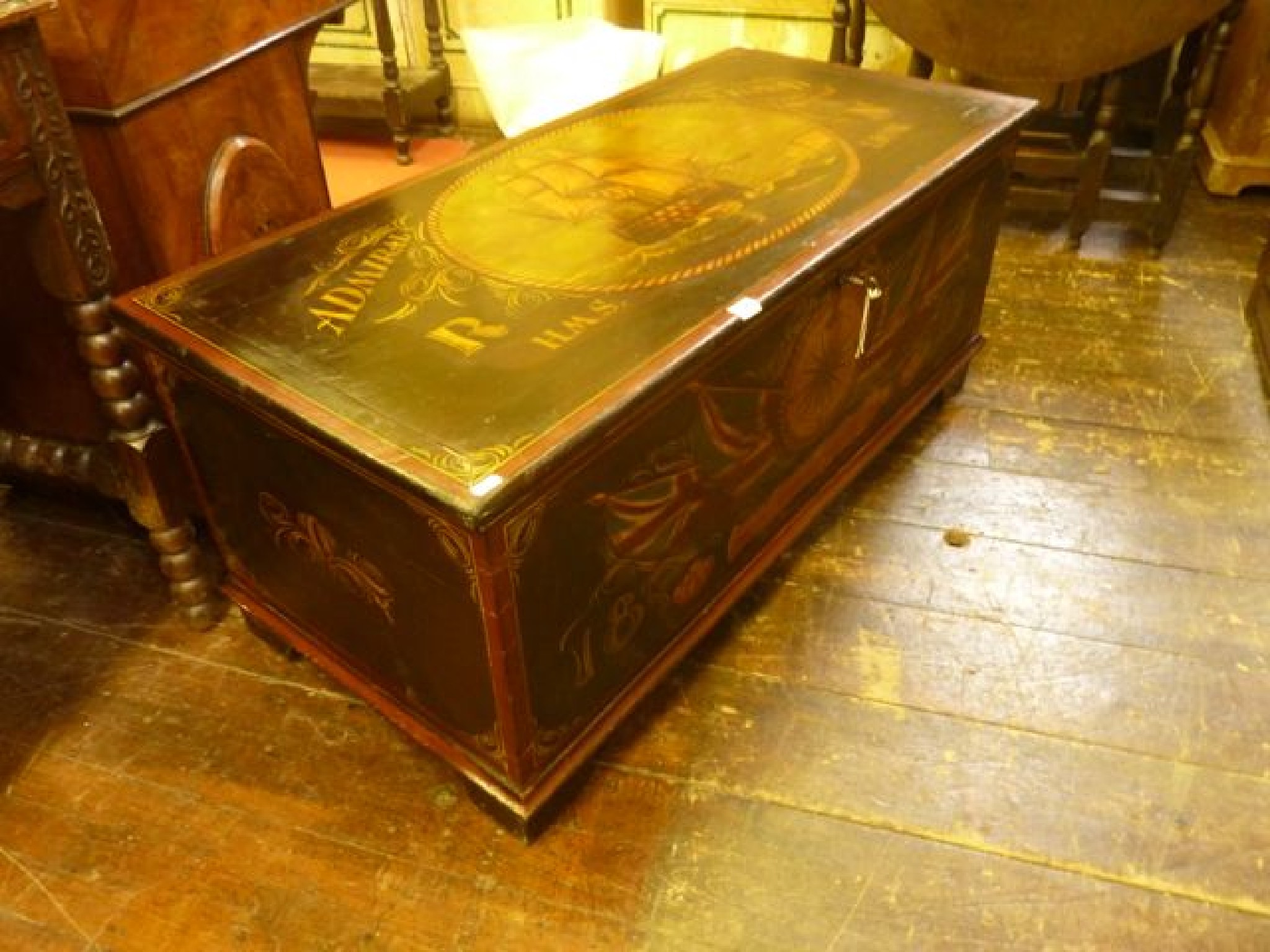 Appraisal: A pine seaman's chest with hinged lid and decorative painted