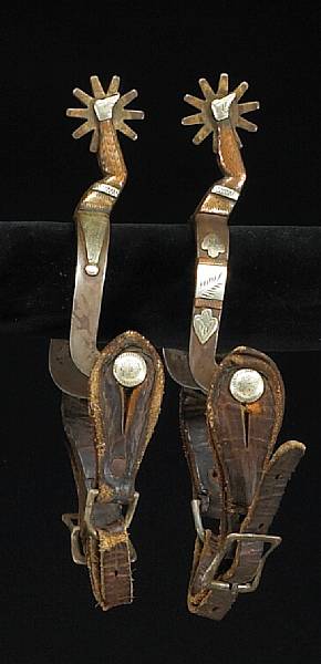 Appraisal: A pair of silver and copper-mounted gal leg spursprobably second