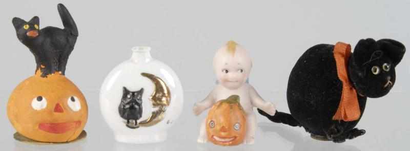 Appraisal: Lot of Small Halloween Pieces Description Includes one small pumpkin