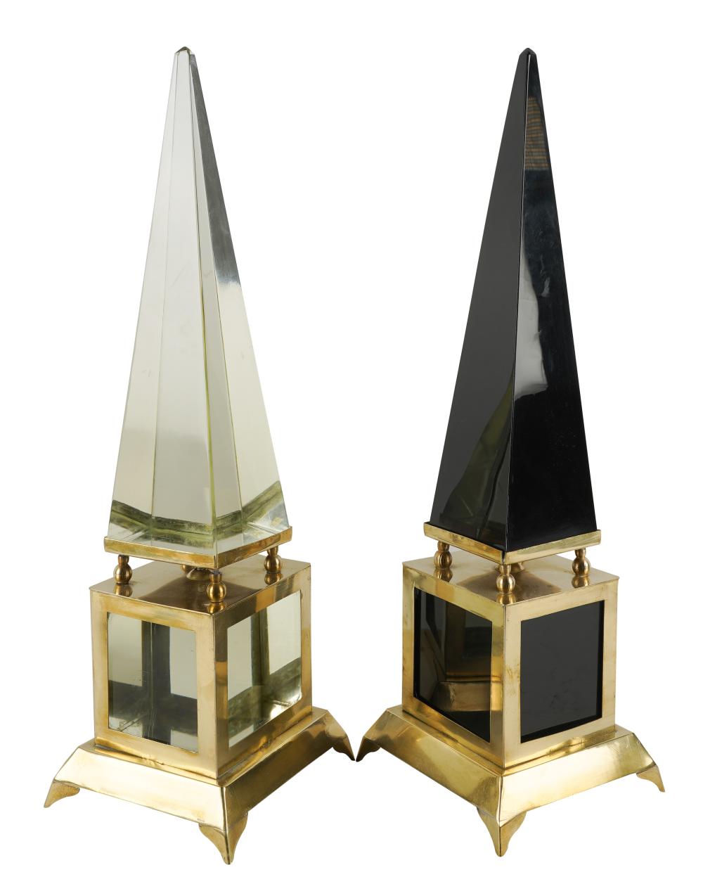 Appraisal: PAIR OF OBELISKSbrass glass and acrylic Provenance The Estate of