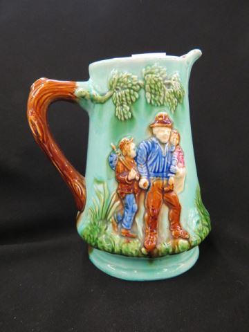 Appraisal: Majolica Pottery Pitcher wayward family scene excellent