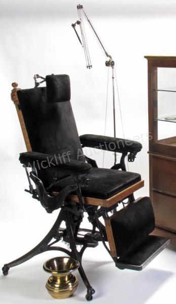 Appraisal: A late Victorian dentist's chair with carved wood frame and