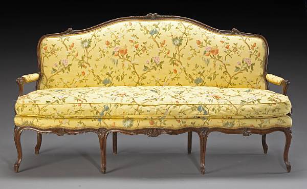 Appraisal: A Louis XV walnut canap Chevigny third quarter th century