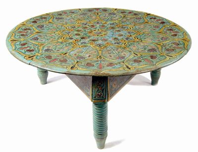 Appraisal: An Eastern European painted pine low table the circular top