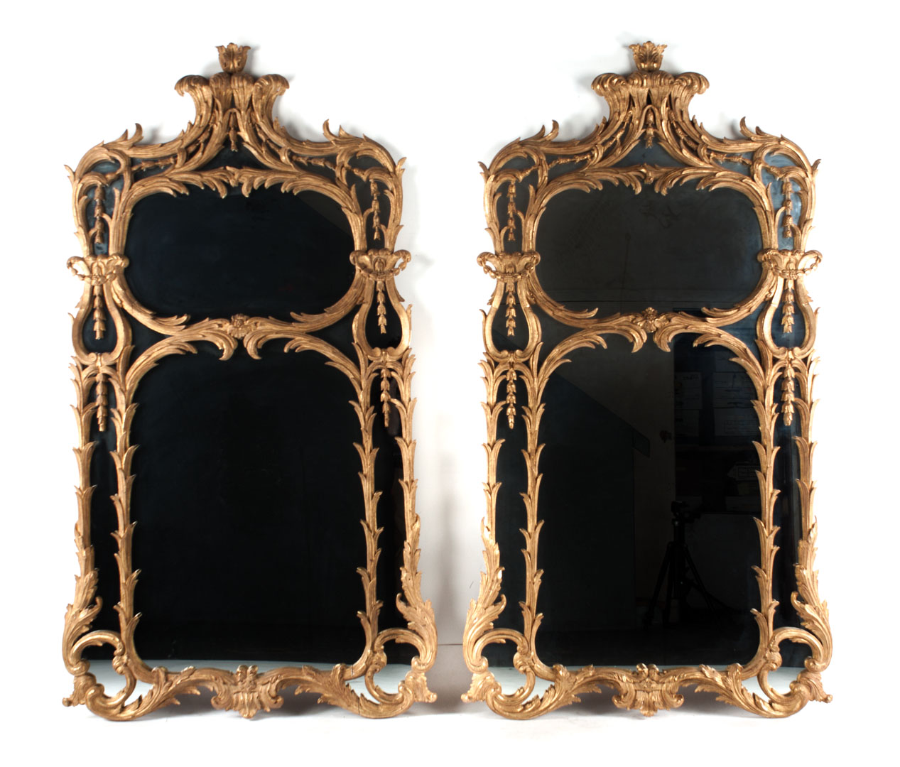 Appraisal: Pair of Italian giltwood mirrors th century elaborately carved and