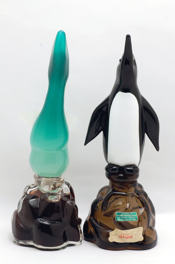 Appraisal: Two Murano glass decanters one black and white penguin stopper