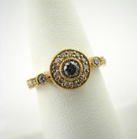 Appraisal: K yellow gold diamond ring round design approximately ct tdw