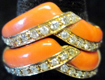 Appraisal: karat yellow gold coral and diamond 'stacking' rings Alternating coral