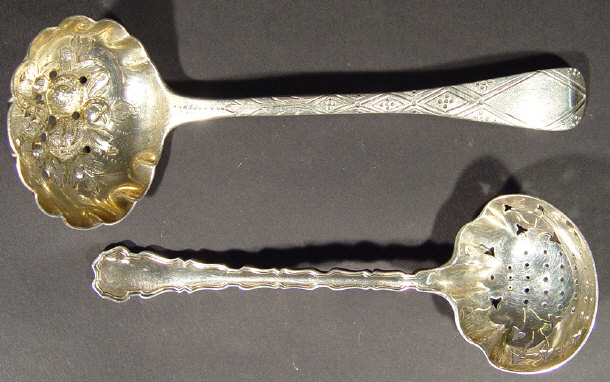 Appraisal: Two silver sifting spoons the bowl of one embossed with