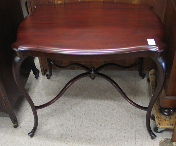 Appraisal: VICTORIAN MAHOGANY LAMP TABLE American c having a rectangular serpentine-shaped