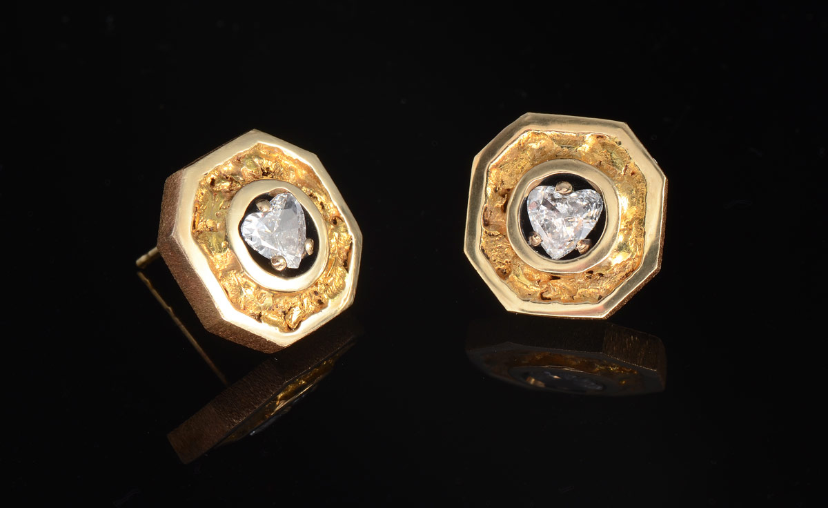 Appraisal: GOLD DIAMOND EARRINGS K yellow gold earrings contain brilliant heart