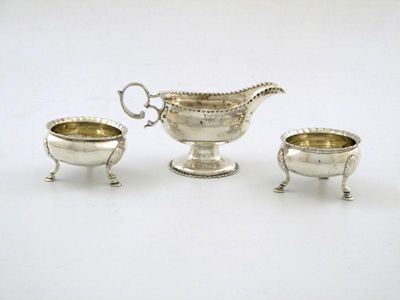 Appraisal: A George III silver cream jug of oval form punch