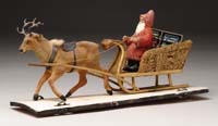 Appraisal: MOSS COVERED SANTA SLEIGH WITH REINDEER ON WHEELED PLATFORM A